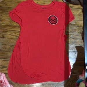 A red marvel long shirt with slits on both sides